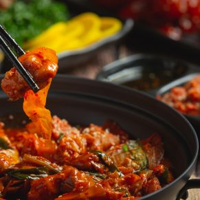 chicken fried in hot pot with spicy sauce in korean style