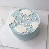 Dreamy cloud lettering cake