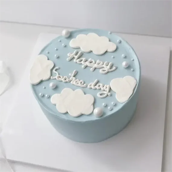 Dreamy cloud lettering cake